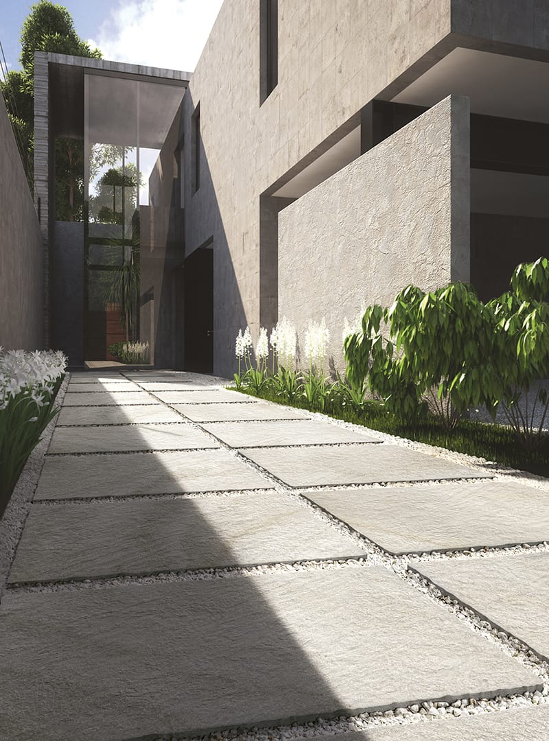 Modern concrete house with flower garden in Mexico (3D render)